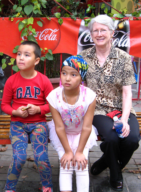 Patty and two Kyrgyz kids