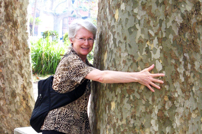 Patty hugging a plane tree