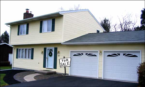 House with For Sale sign